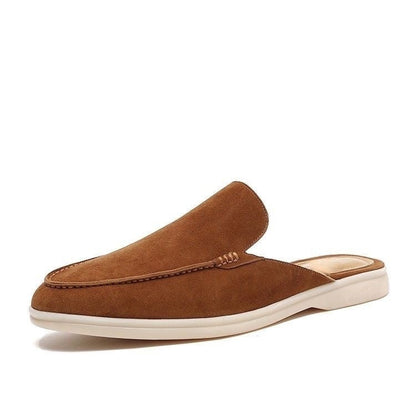 Moc toe slip-on loafers with stitched trim and low flat soles