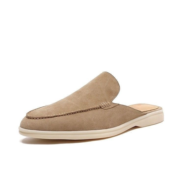 Moc toe slip-on loafers with stitched trim and low flat soles