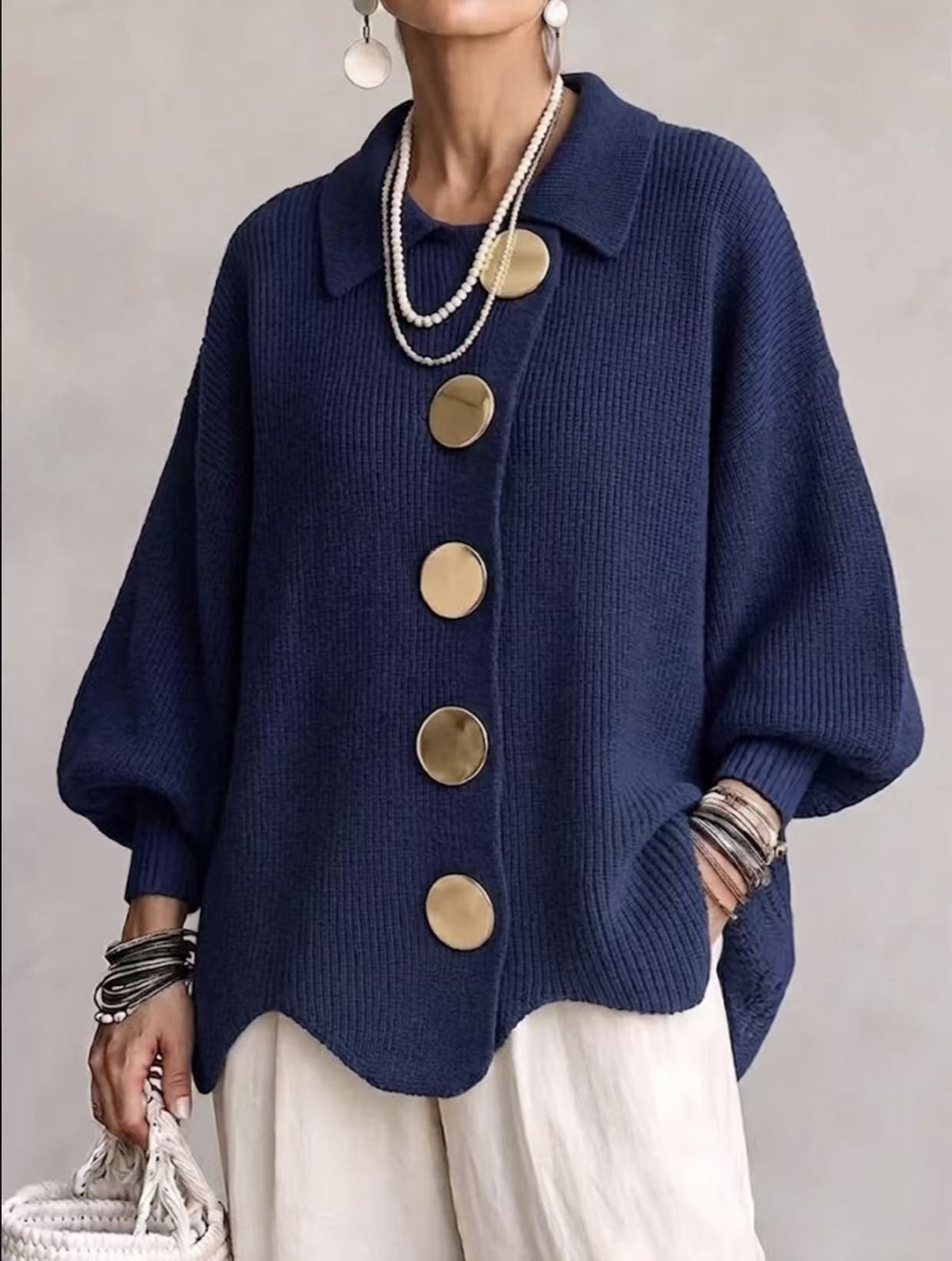 Women's oversized ribbed button-front cardigan with collared neckline and long sleeves