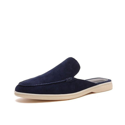 Moc toe slip-on loafers with stitched trim and low flat soles