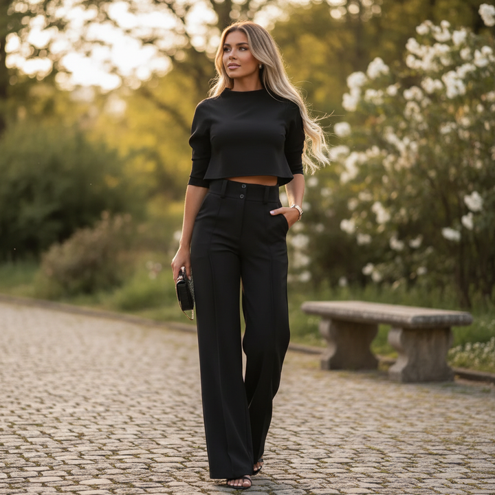 Women's two-piece trouser suit with high-neck cropped top