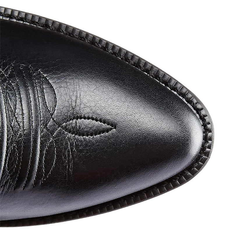 Tall embroidered western cowboy boots with pointed toes and low heels