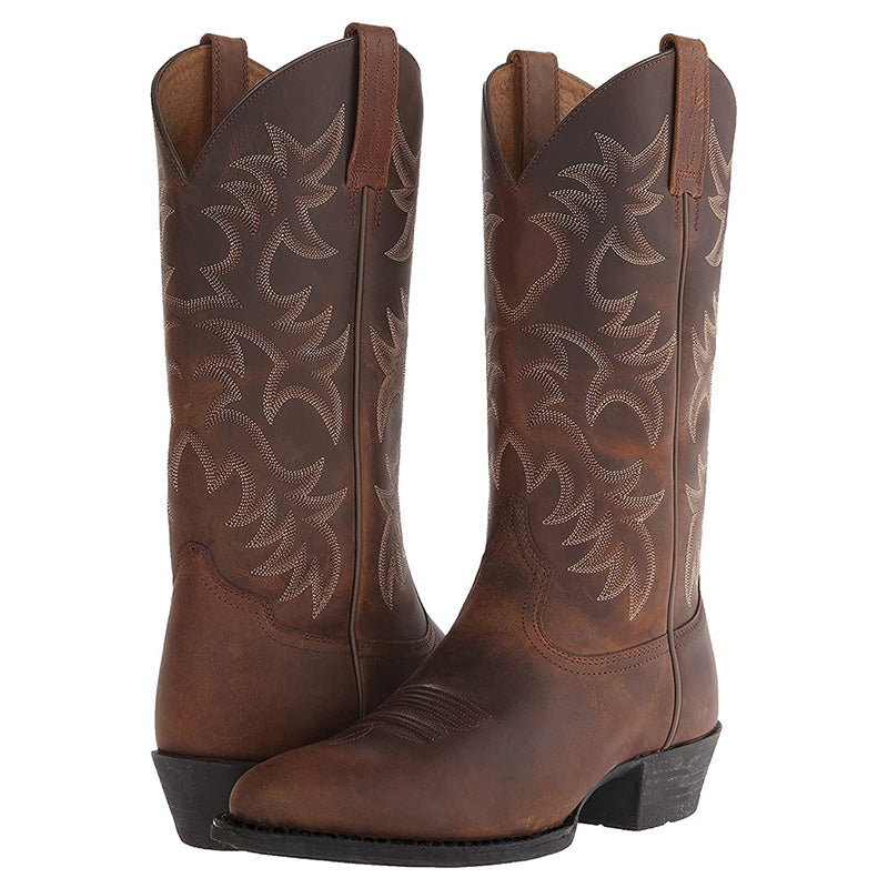 Tall embroidered western cowboy boots with pointed toes and low heels