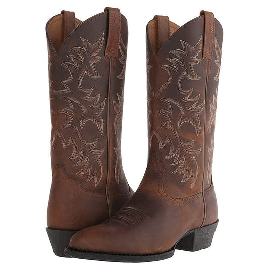 Tall embroidered western cowboy boots with pointed toes and low heels