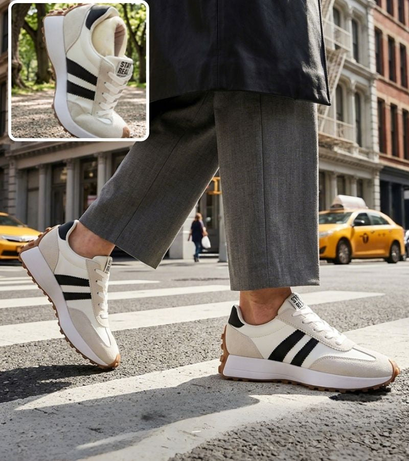 Low-top striped lace-up sneakers with contrasting panels and textured soles
