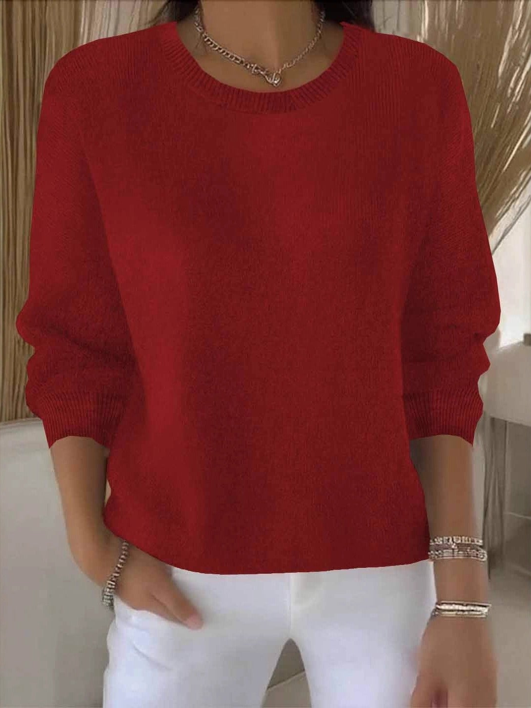 Women's crew neck long sleeve knit sweater with ribbed trims