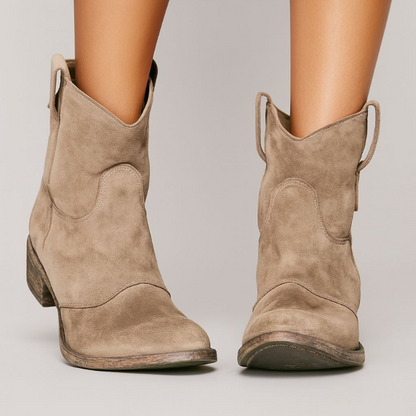 Women's western ankle boots with pull tabs, curved seams and low heels