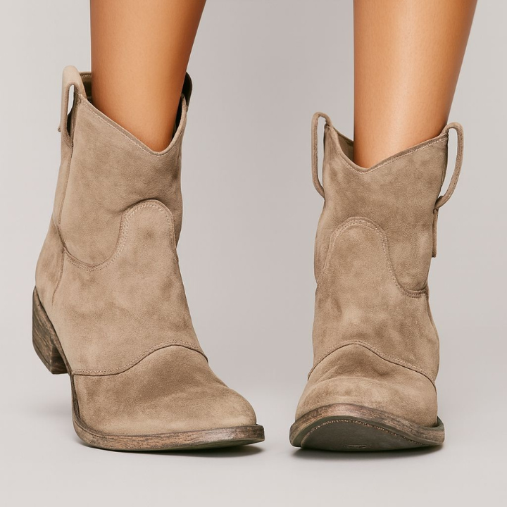 Women's western ankle boots with pull tabs, curved seams and low heels