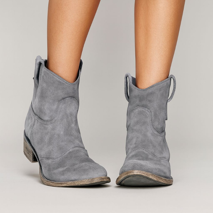 Women's western ankle boots with pull tabs, curved seams and low heels
