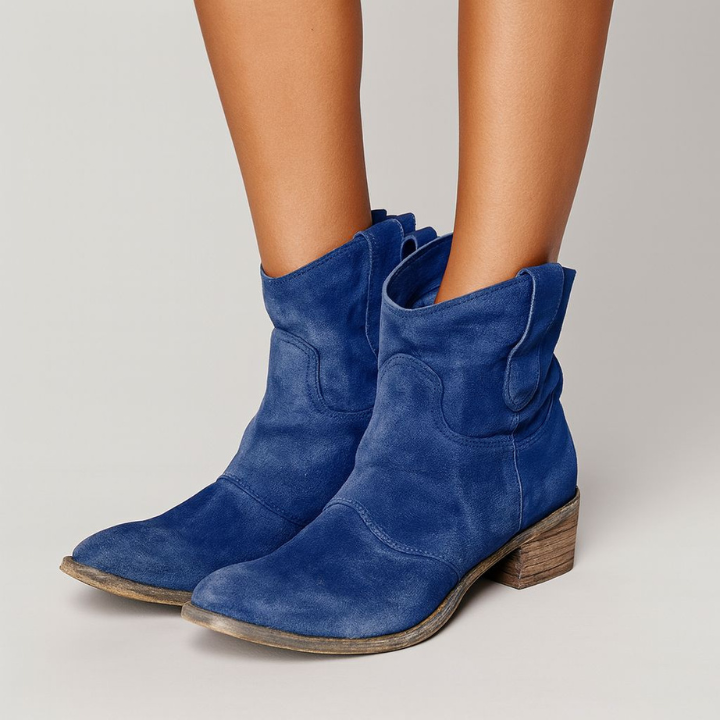 Women's western ankle boots with pull tabs, curved seams and low heels