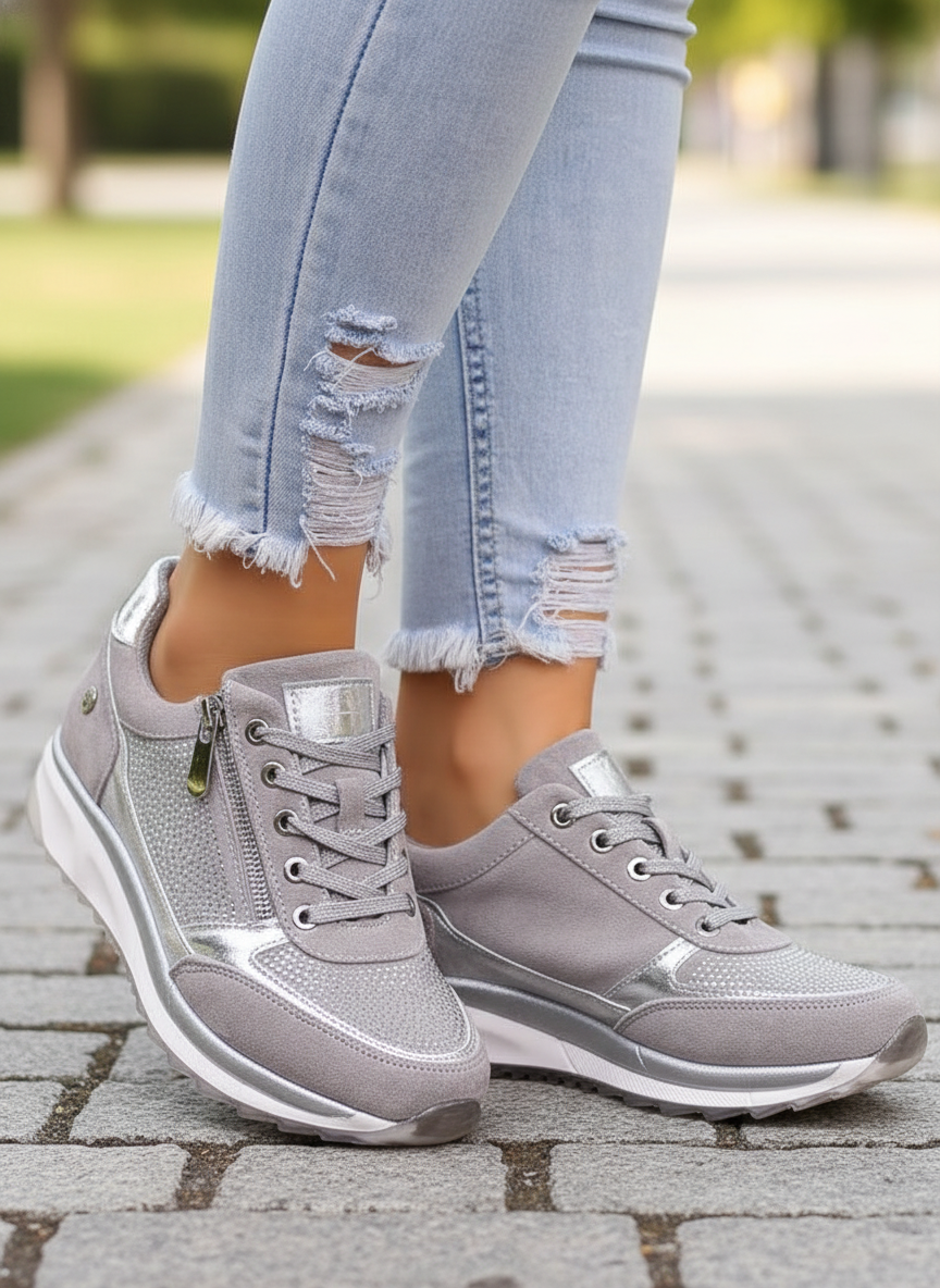 Women's low-top lace-up sneakers with metallic panels and textured soles