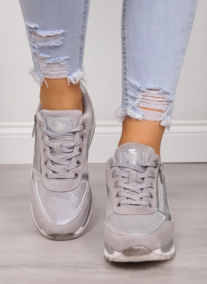 Women's low-top lace-up sneakers with metallic panels and textured soles