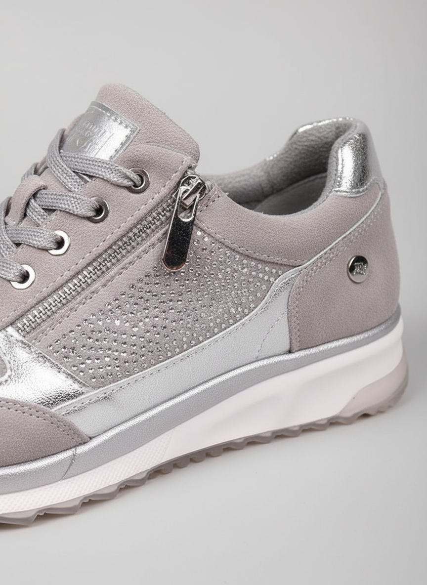 Women's low-top lace-up sneakers with metallic panels and textured soles