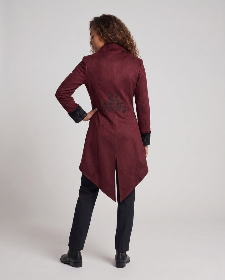 Women's embroidered long tailcoat jacket with raised collar, decorative buttons and pointed tails