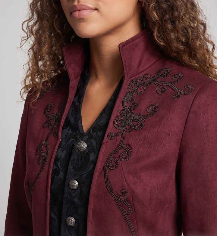 Women's embroidered long tailcoat jacket with raised collar, decorative buttons and pointed tails