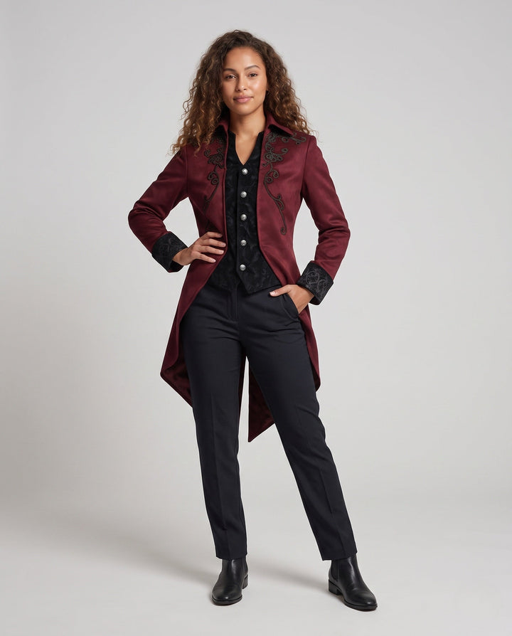 Women's embroidered long tailcoat jacket with raised collar, decorative buttons and pointed tails