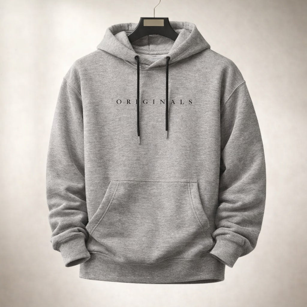 Relaxed fit pullover hoodie with drawstring hood, long sleeves, kangaroo pocket and chest lettering