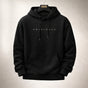 Relaxed fit pullover hoodie with drawstring hood, long sleeves, kangaroo pocket and chest lettering