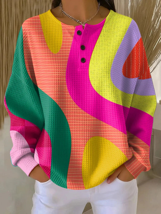 Women's relaxed geometric colour-block waffle sweatshirt with button crew neckline in bright multi-colour