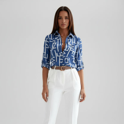 Women's collared shirt with abstract geometric print and rolled three-quarter sleeves