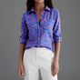 Women's collared shirt with abstract geometric print and rolled three-quarter sleeves