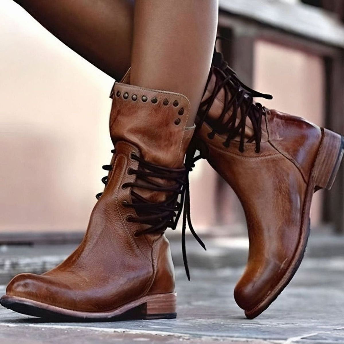 Women's lace-up ankle boots with studded ankle trim and low heels