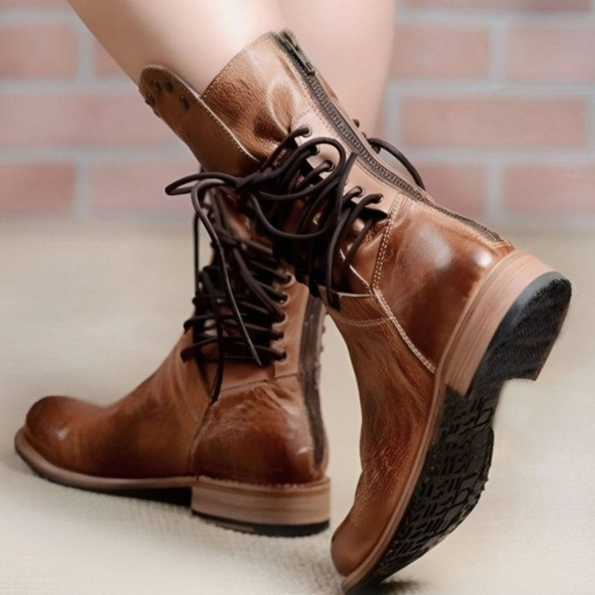 Women's lace-up ankle boots with studded ankle trim and low heels