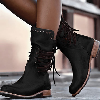 Women's lace-up ankle boots with studded ankle trim and low heels