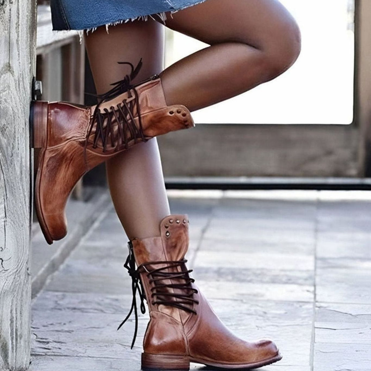 Women's lace-up ankle boots with studded ankle trim and low heels