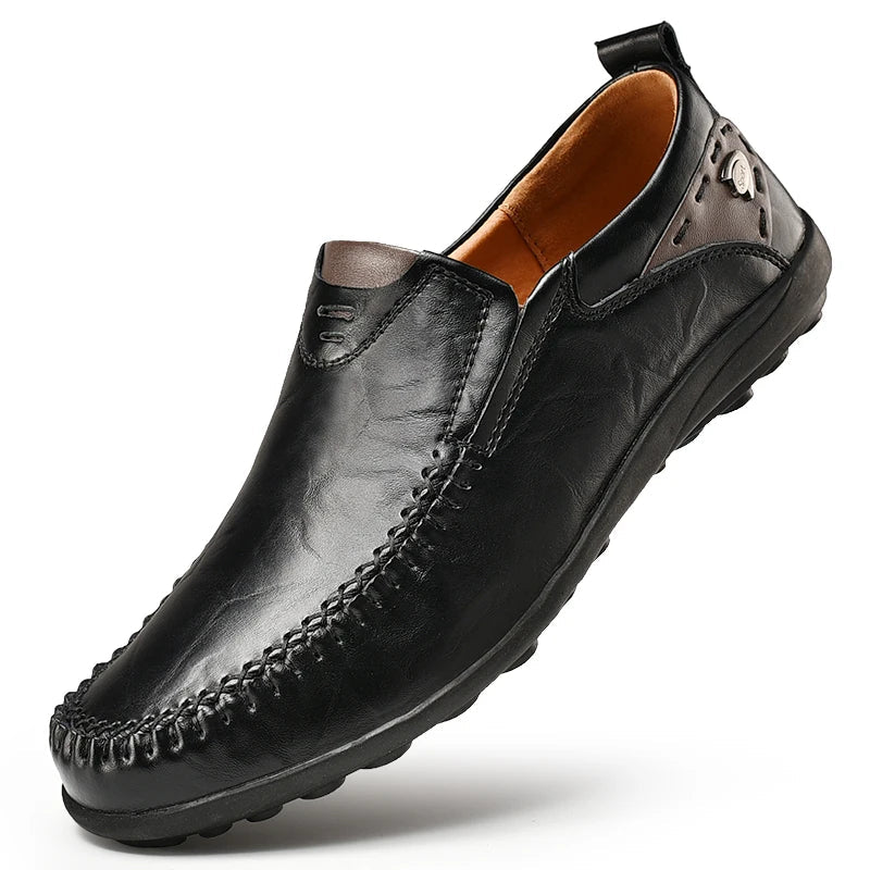 Men's slip-on loafers with moc-toe stitching and textured flat soles