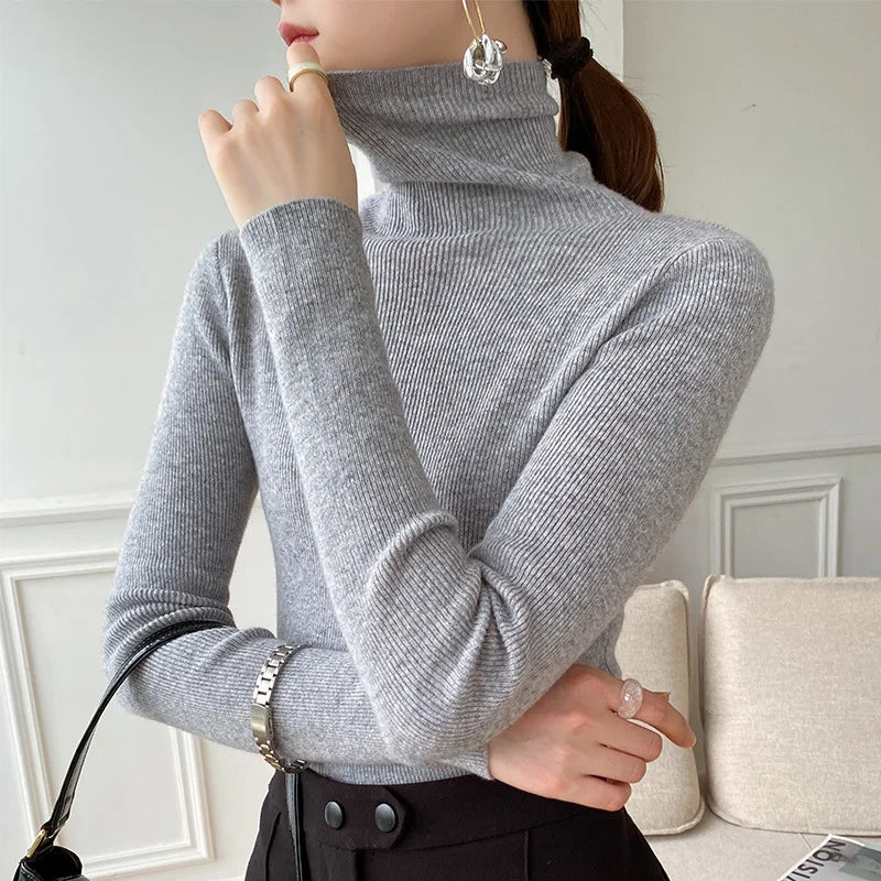 Women's ribbed turtleneck sweater with long sleeves and a slim fit