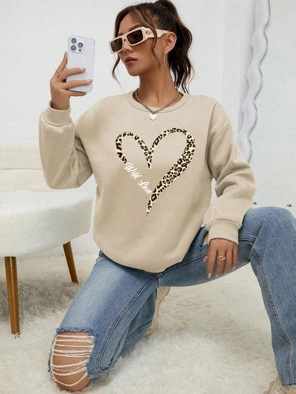 Women's sweatshirt with leopard-print heart graphic, crew neckline and long sleeves