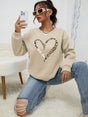 Women's sweatshirt with leopard-print heart graphic, crew neckline and long sleeves