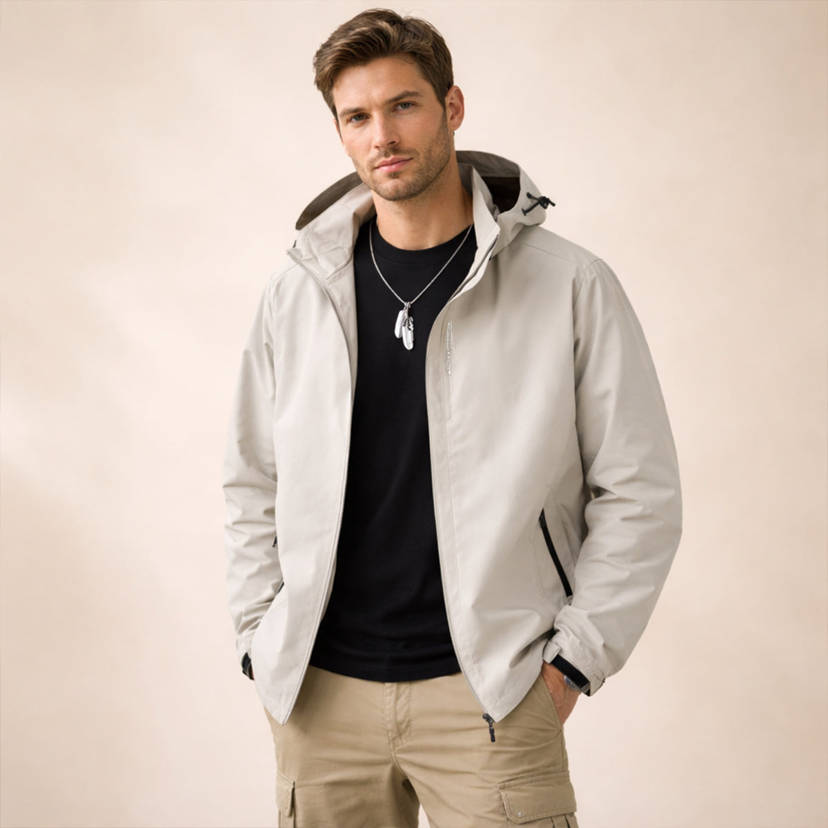 Men's hooded zip-front rain jacket with long sleeves and side zip pockets
