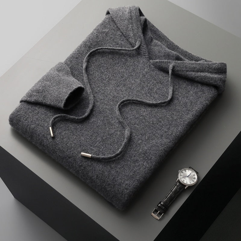 Unisex knit hoodie with drawstring hood and ribbed cuffs