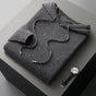 Unisex knit hoodie with drawstring hood and ribbed cuffs