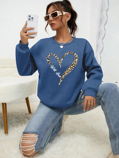 Women's sweatshirt with leopard-print heart graphic, crew neckline and long sleeves
