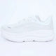 Low-top lace-up running sneaker with thick cushioned sole