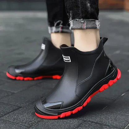 Terrain ankle boots with round toes, pull tabs and lugged soles