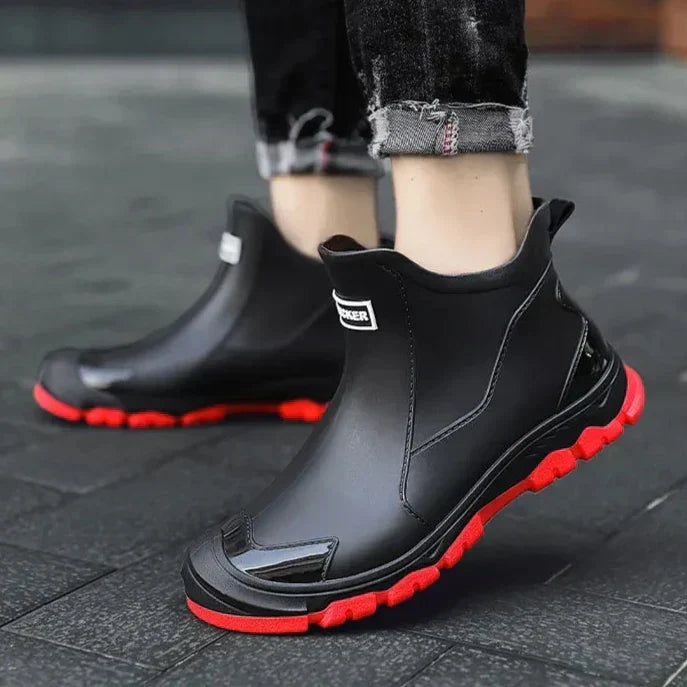 Terrain ankle boots with round toes, pull tabs and lugged soles