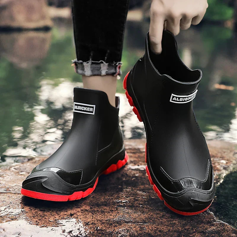 Terrain ankle boots with round toes, pull tabs and lugged soles