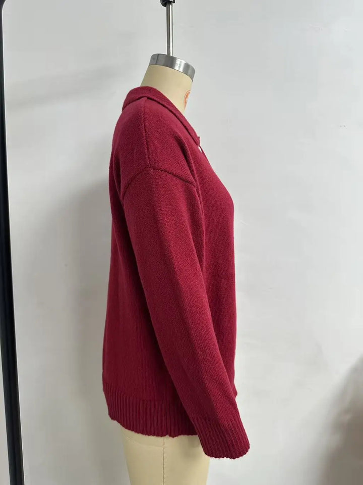 Women's collared knit sweater with button placket and long sleeves