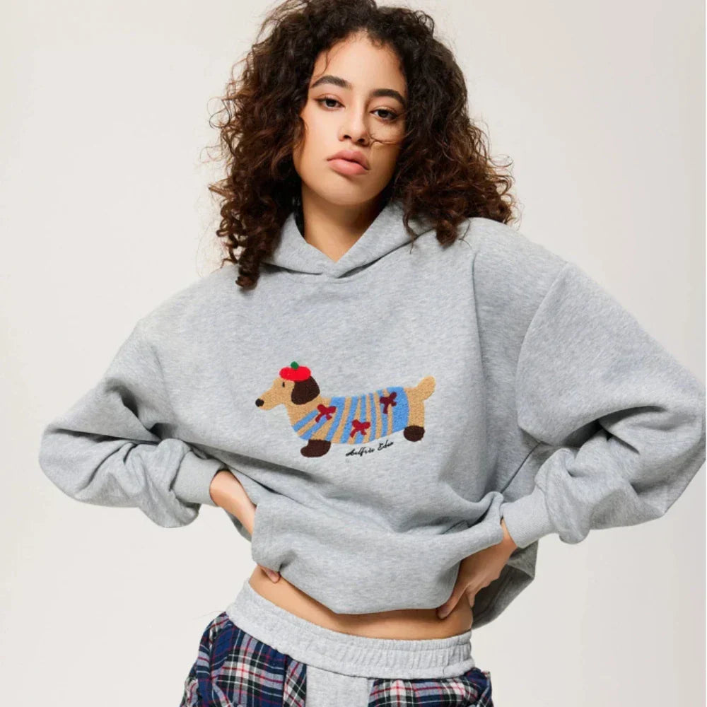 Women's hooded sweatshirt with dog graphic and kangaroo pocket