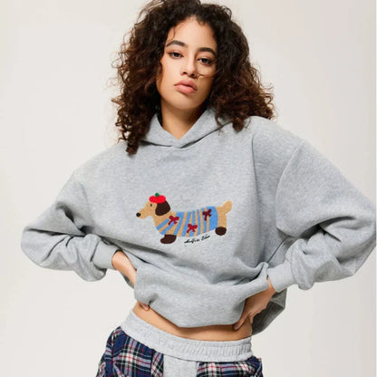 Women's hooded sweatshirt with dog graphic and kangaroo pocket