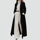 Women's black long double-breasted coat with notched lapels and long sleeves