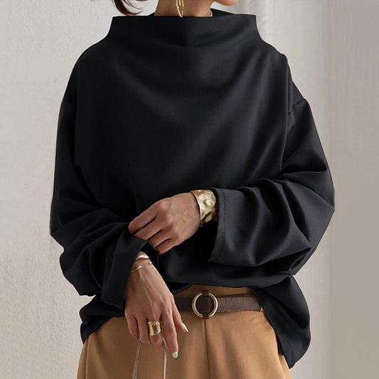 Women's relaxed high-neck top with long sleeves and wide cuffs