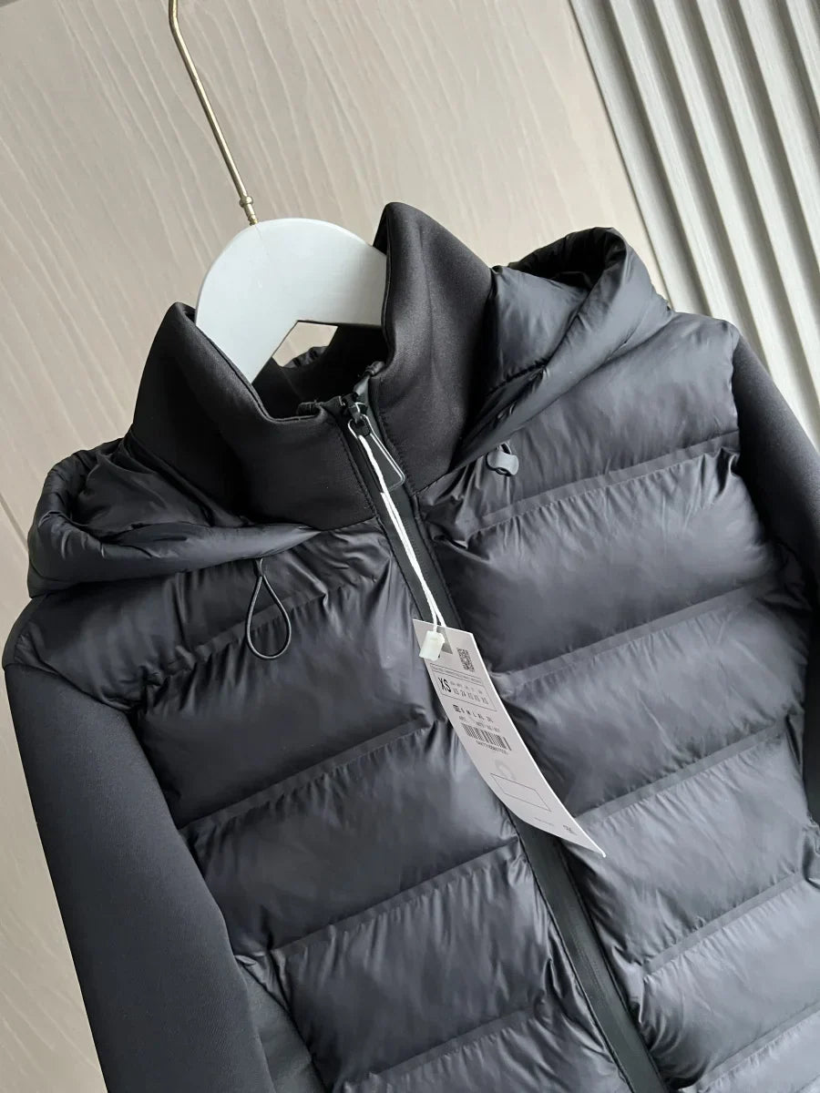 Women's black cropped hooded puffer jacket with long sleeves and front zip