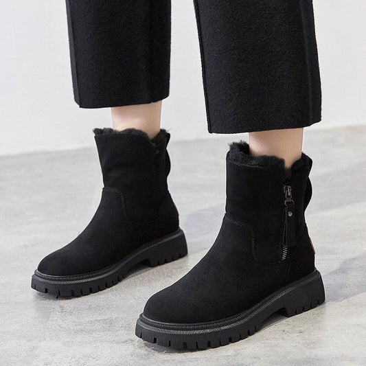 Women's ankle boots with fur-trimmed openings and chunky lug soles
