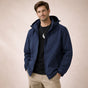 Men's hooded zip-front rain jacket with long sleeves and side zip pockets