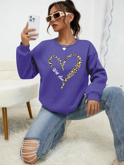 Women's sweatshirt with leopard-print heart graphic, crew neckline and long sleeves